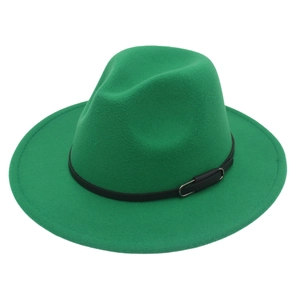 Detail of green cashmere fedora hat with a black leather band and metal buckle