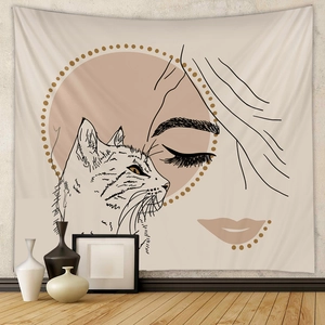 Detailed view of minimalist line art tapestry with female profile and cat on white wall