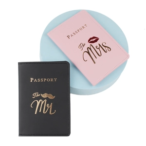 Pink and black PU leather passport covers for couples featuring Mr and Mrs gold stamping