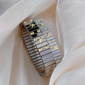Italian style stretch bracelet with silver rectangular links and gold star charms