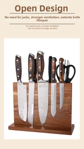 Detail of wooden magnetic knife block with hammered blade knives and shears
