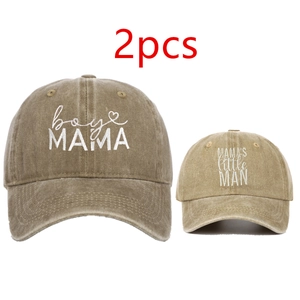 Detail of embroidered MAMA and Little Man baseball caps set in vintage washed cotton