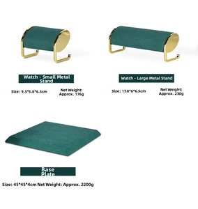 Detail view of green velvet and gold metal watch display stands with base plate