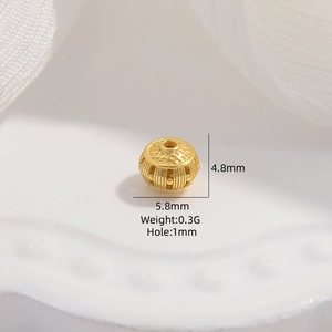 Macro view of gold S925 spacer bead with detailed dimensions 5.8mm x 4.8mm and 1mm hole