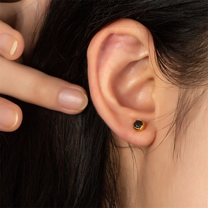 Classic round titanium steel studs with gold plating and black zircon for women