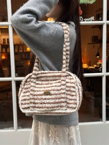 Brown and beige striped plush shoulder bag with fluffy faux fur texture for winter