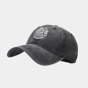 Close-up of vintage washed cotton baseball cap with white Motherhood printed text