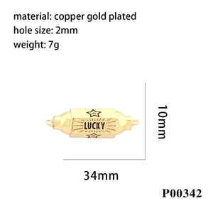 Macro view of copper gold plated Lucky charm with dimensions 34mm and 2mm hole