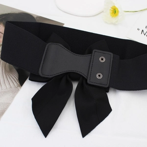Women's black elastic wide waist belt with a stylish large cotton bow and snap closure