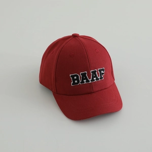 Close-up of deep red twill cotton baseball cap with BAAF embroidery and stitching