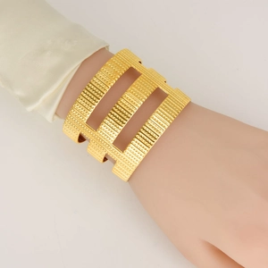 Luxurious 18K gold plated 304 stainless steel open bangle with hollow vertical patterns