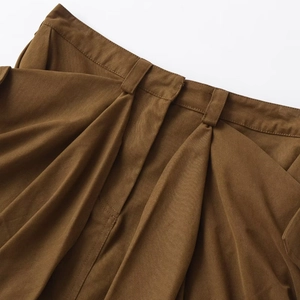 Women's brown mid-waist utility skirt with twill texture and pleated waist detail