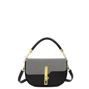 Chic black and grey color-block crossbody bag with gold hardware and fabric texture