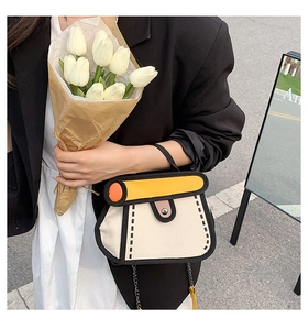 2D cartoon style canvas crossbody bag featuring bold outlines and metal chain strap detail