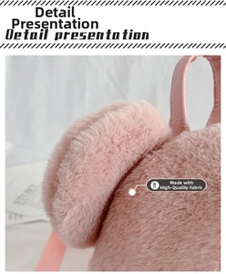 Detail shot of the premium pink plush fabric and soft leather strap on this fluffy backpack