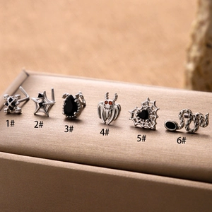 Set of six vintage gothic nose studs featuring heart, spider web and bat designs in black