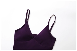 Detail of deep purple yoga tank top featuring a V-neckline and adjustable slim straps