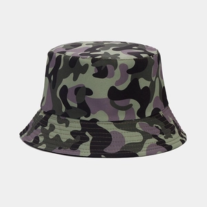 Detailed view of camouflage bucket hat showing reinforced stitching on the brim