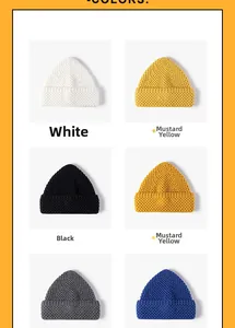 Close-up detail of textured knit beanies in multiple colors including yellow and blue