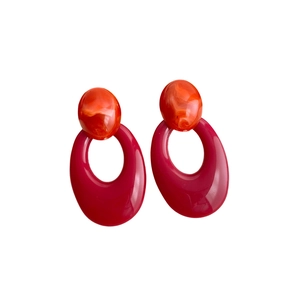 Modern acrylic hoop earrings with orange marble resin stud and dark red oval pendant