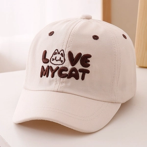 Close-up of LOVE MY CAT embroidery on a beige soft cotton kids baseball cap