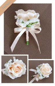 Detail view of champagne silk rose boutonniere with rhinestones and ribbon for weddings