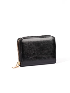 Side view of black oil wax leather card holder with premium gold zipper and glossy finish