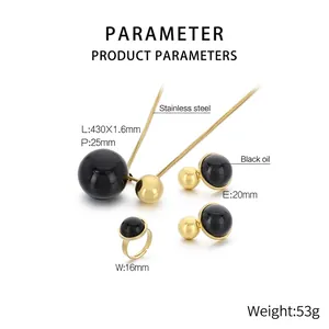 Detailed view of 18K gold plated stainless steel jewelry set with black oil drip accents