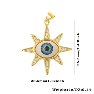 Detail of gold evil eye pendant with blue zircon and radial beams, 36.5mm height