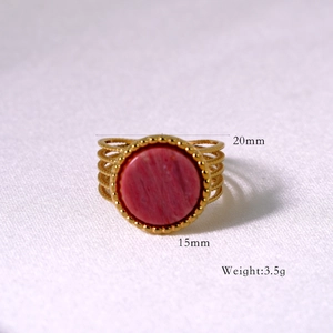 Detail view of gold multi-layer ring with pink gemstone and size dimensions