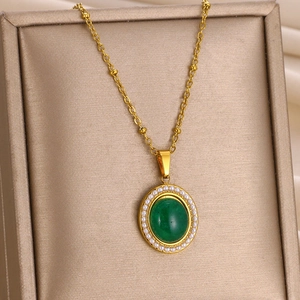 Vintage gold stainless steel necklace with emerald oval stone and pearl heart pendant