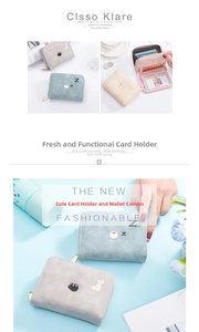 Détail d'un portefeuille porte-cartes avec broderie animale et compartiment zippé élégant