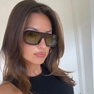 Fashionable aviator oversized sunglasses with retro brown frame and tinted lenses
