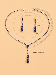 Detailed view of silver necklace and blue gemstone earrings with size dimensions