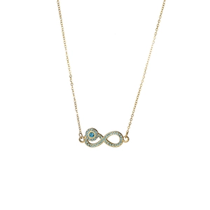 Detail of infinity pendant with blue crystals on a delicate golden link chain