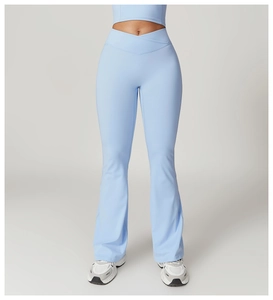 Close-up of V-shaped high-waisted waistband on light blue flared yoga pants for women