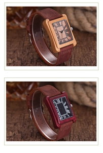 Close-up of rectangular wooden watches with Roman numerals and genuine leather straps