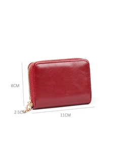 Detailed size view of red glossy leather card wallet showing dimensions 11cm x 8cm x 2.5cm
