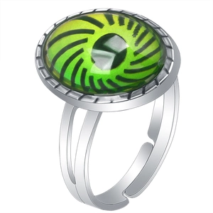 Detailed shot of an adjustable silver ring featuring a green color-changing gemstone
