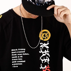 Unisex stainless steel hollow bead necklace worn by model with streetwear style t-shirt
