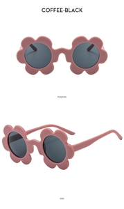 Close-up of petal-shaped kids sunglasses in matte dusty rose with dark UV lenses