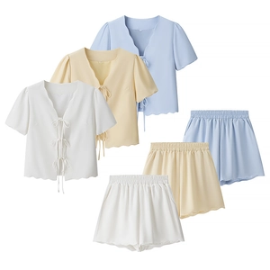 Women's 2-piece loungewear set with tie-front V-neck top and wavy edge shorts