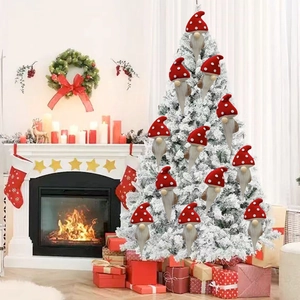 Christmas faceless gnome ornaments with red polka dot mushroom hats on a white tree