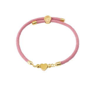 Detail of pink woven cord bracelet featuring polished gold heart bead and adjustable clasp