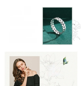 Macro shot of 925 silver leaf ring with zircon details and lifestyle model view