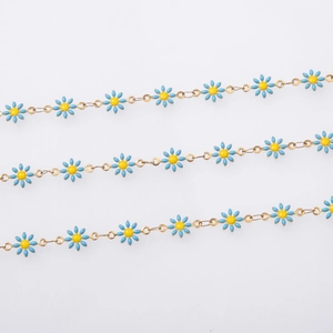 Detail of blue and yellow daisy flower link chain with 18k gold plating finish
