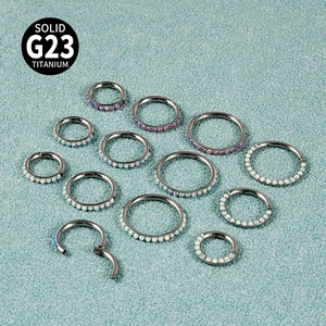 G23 titanium nose rings and ear hoops set with opal stones in various sizes