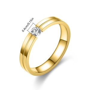 Minimalist gold titanium steel ring for couples featuring a 4mm diamond set in a center groove