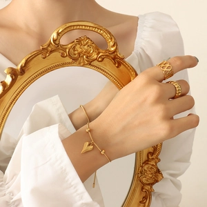 French vintage style heart charm bracelet and gold textured ring set for women