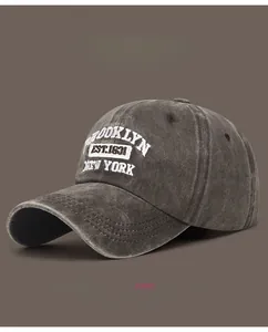 Detail of Brooklyn New York embroidery on washed cotton vintage baseball cap